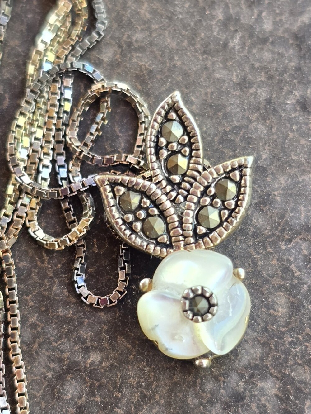 Stunning Art Deco inspired carved mother of pearl sterling silver marcasite